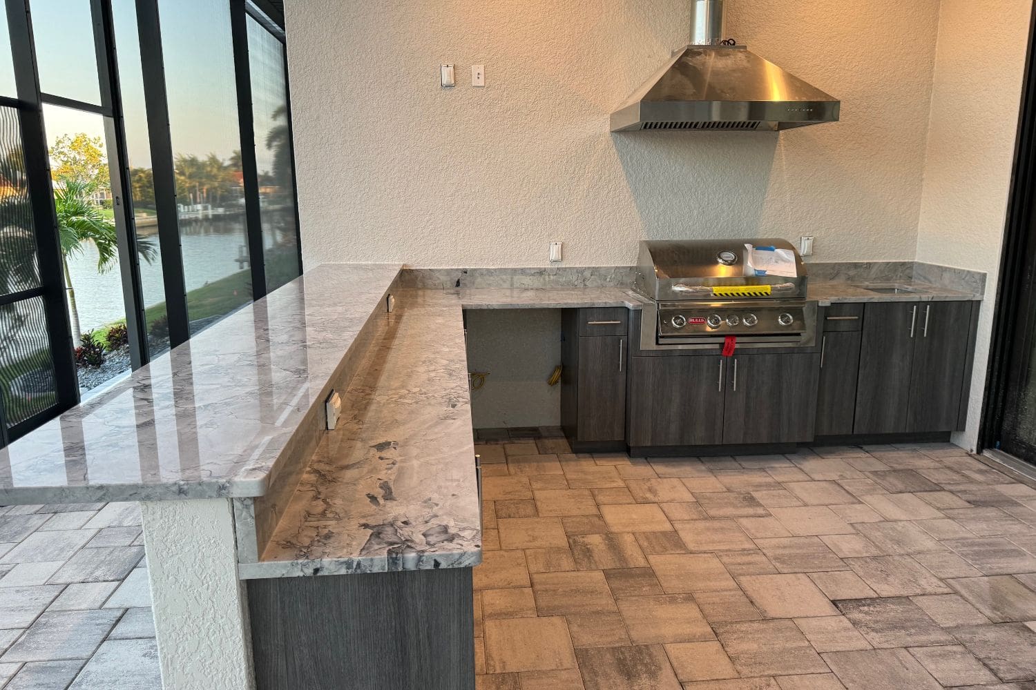 A kitchen with an oven and counter in it