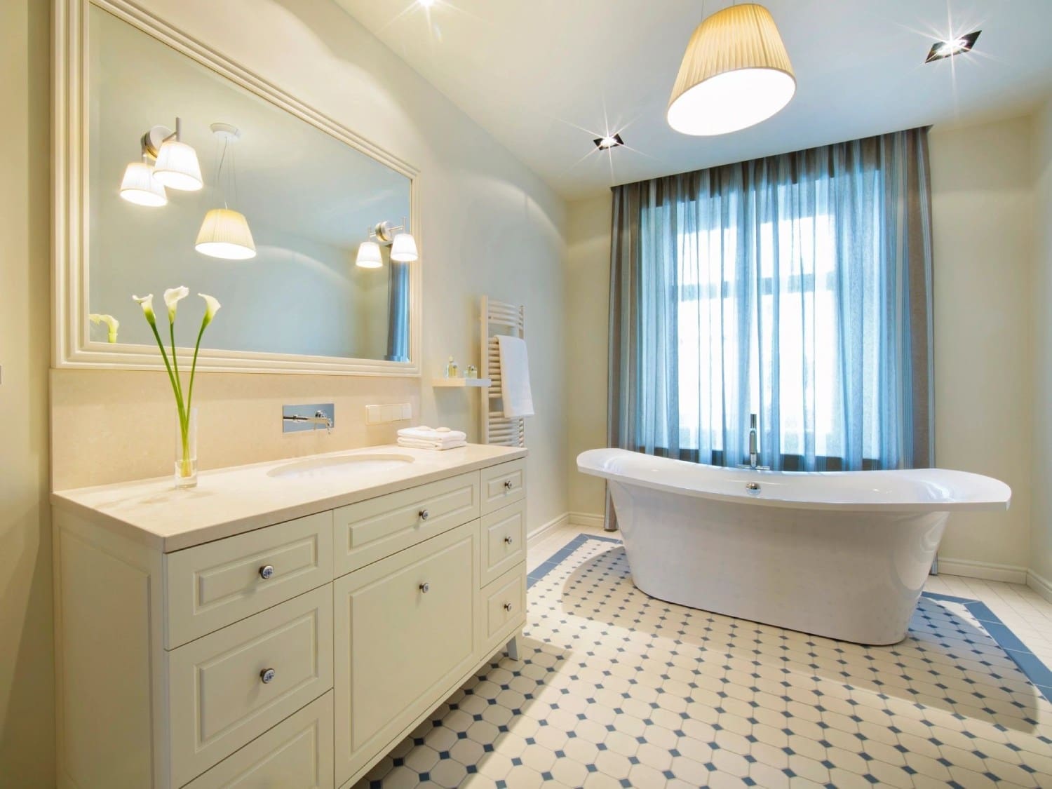 A bathroom with a tub and sink in it